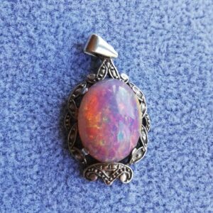 Vintage synthetic opal pendant set in Sterling silver