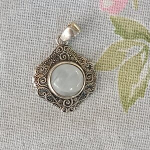 Moonstone pendant with filigree detail set in sterling silver