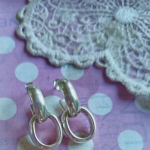 Sterling silver double hoop earrings.