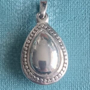 Sterling silver teardrop /dome pendant with dot detail .
