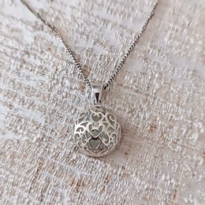 Round , engraved Sterling silver & Opaline pendant.