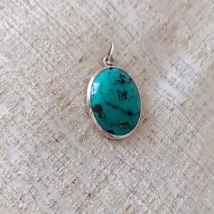 Turquoise pendant set in Sterling silver.